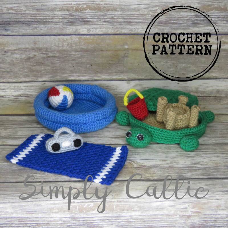 Crochet pattern playset that includes a small swimming pool, beach ball, beach towel, radio, turtle sandbox, sandcastle and sand bucket.